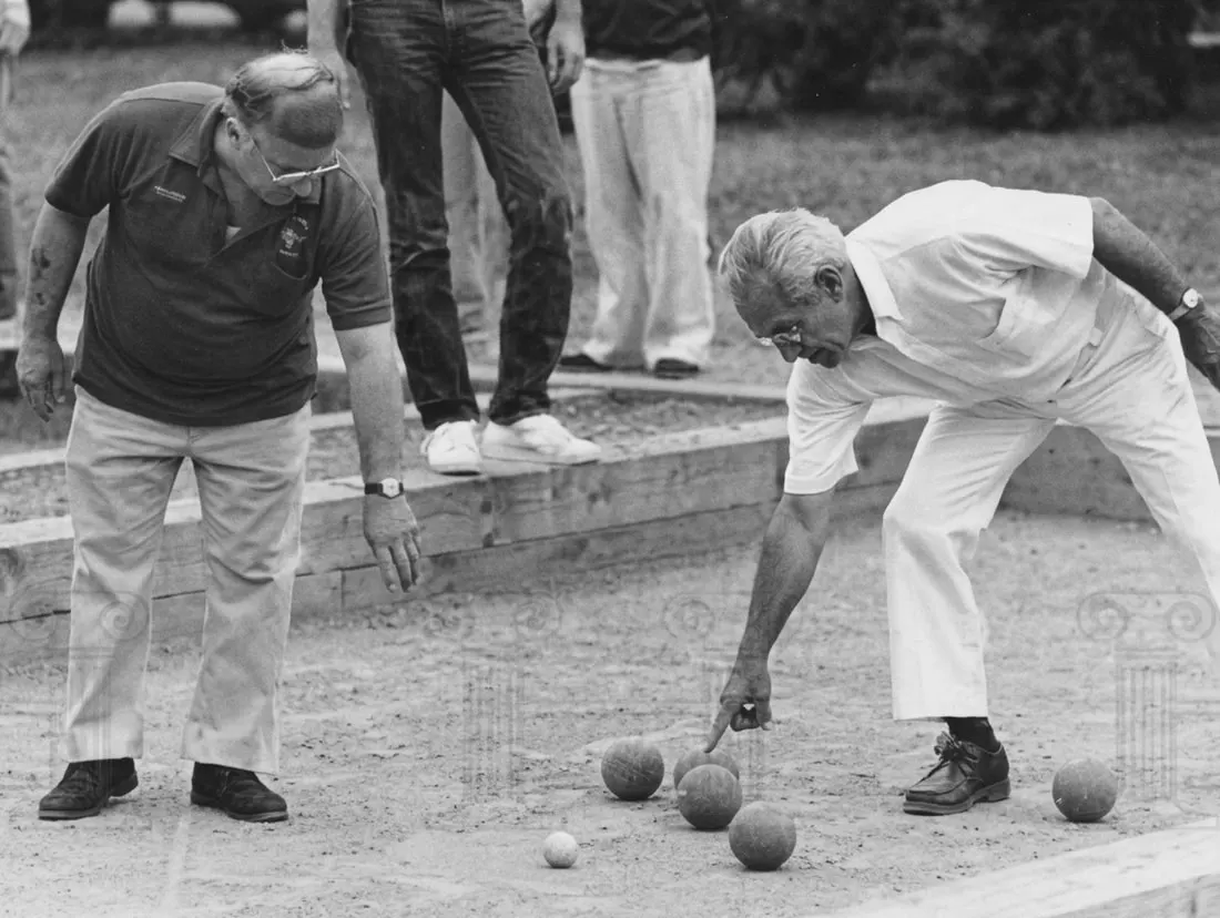 Two players checking a point at Scalzi Park
